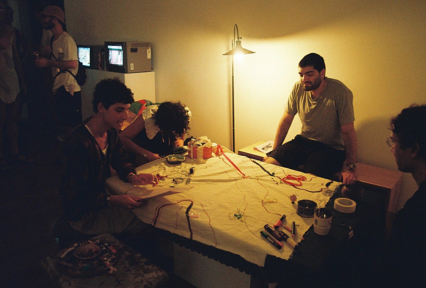 Visitors drawing on the map at a table