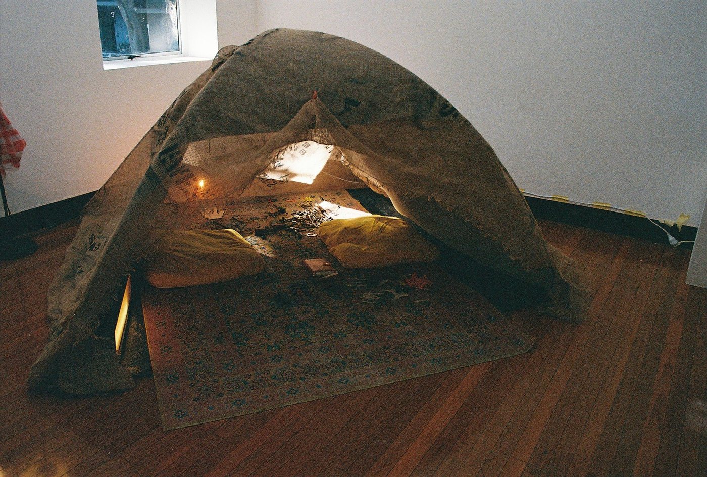 The tent, glowing from inside